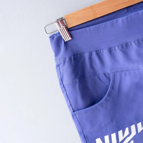کراپ و شلوارک جیبدار زنانه طرح NIKE مدل Am