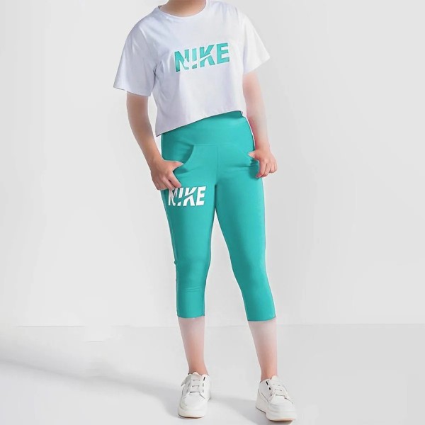 کراپ و شلوارک جیبدار زنانه طرح NIKE مدل Am