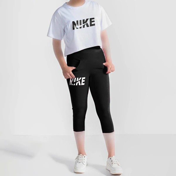 کراپ و شلوارک جیبدار زنانه طرح NIKE مدل Am