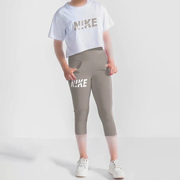کراپ و شلوارک جیبدار زنانه طرح NIKE مدل Am