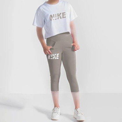 کراپ و شلوارک جیبدار زنانه طرح NIKE مدل Am
