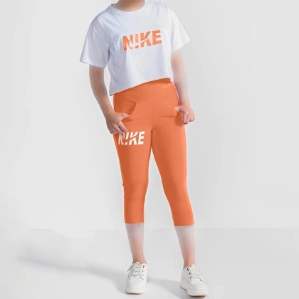 کراپ و شلوارک جیبدار زنانه طرح NIKE مدل Am